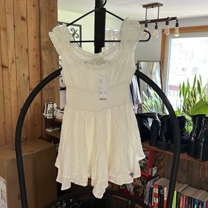 New with tags white flowy romper